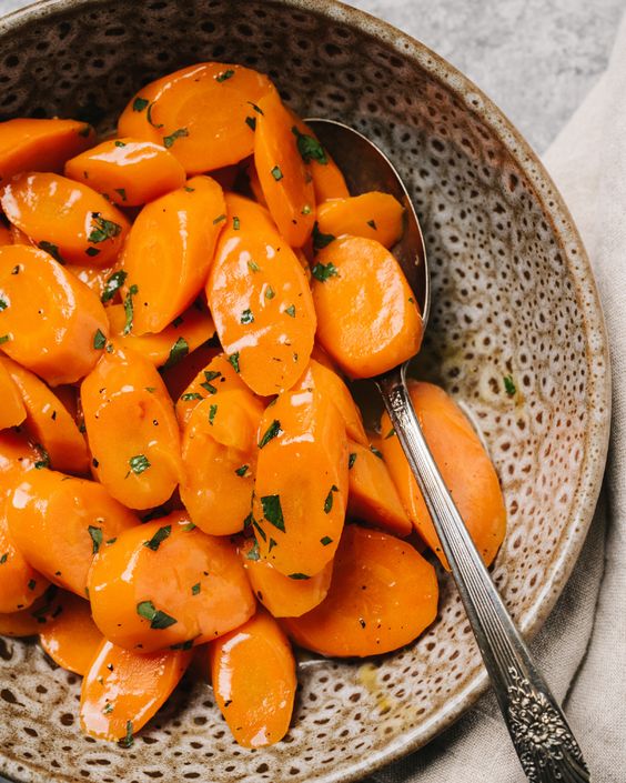 A bowl full of sweet carrots.