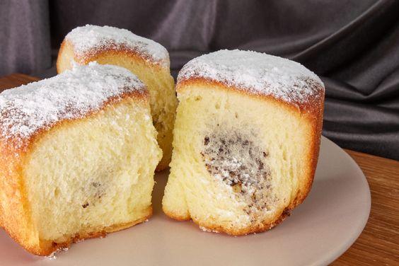 Sugar sprinkled yeast buns with nut filling.