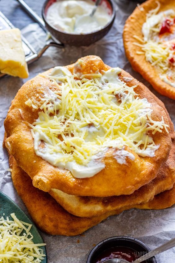 Crispy baked dough with cheese and sour cream.