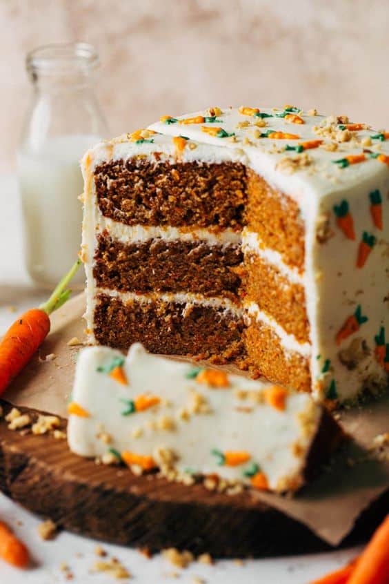Fluffy and soft carrot cake with white marzipan.