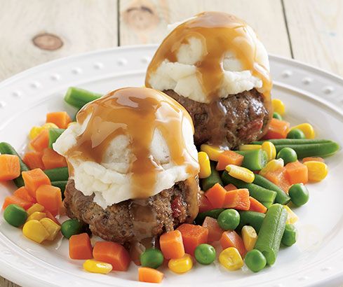 Meatballs with vegetables and mashed potatoes.
