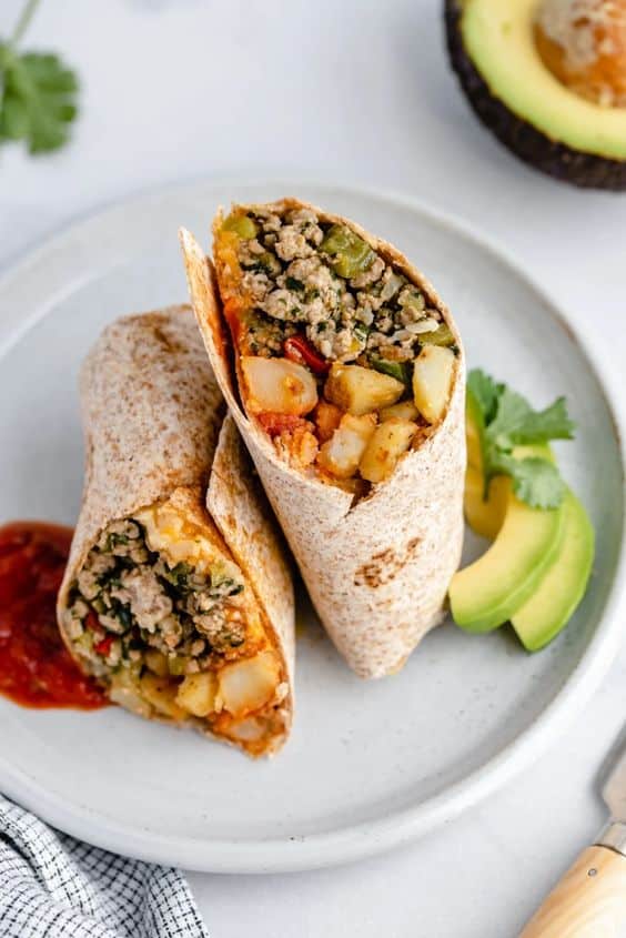 Whole wheat tortilla filled with meat, vegetables and potatoes.
