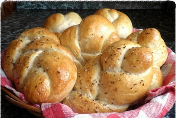 Homemade buns in an oven.