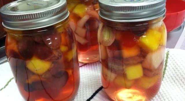 Canned fruit in jars.
