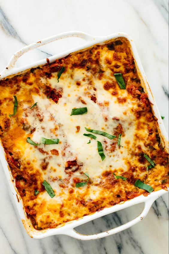 Golden and delicious lasagna, baked with ham and cheese on top.