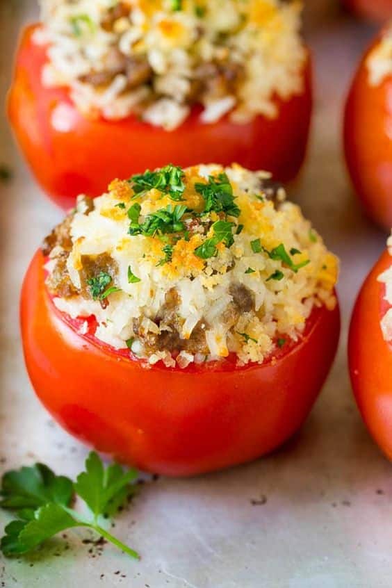 Fresh tomatoes stuffed with cheese and herbs.