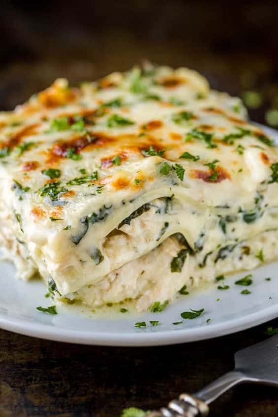 Creamy lasagna with chicken and spinach filling.