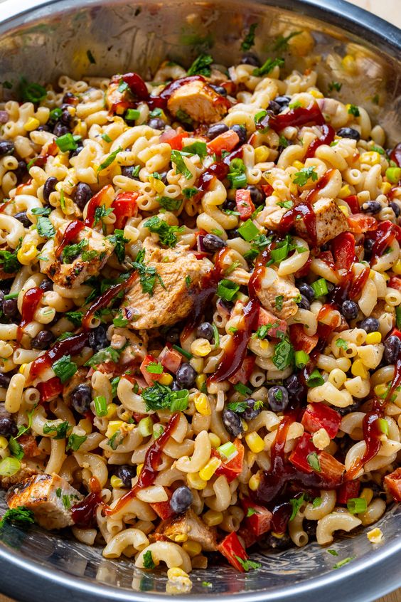 A delicious light pasta salad with corn and chicken.