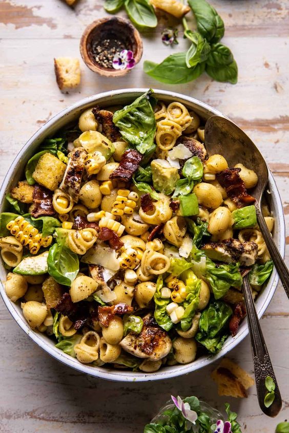 Delicious pasta salad with vegetables and dressing.